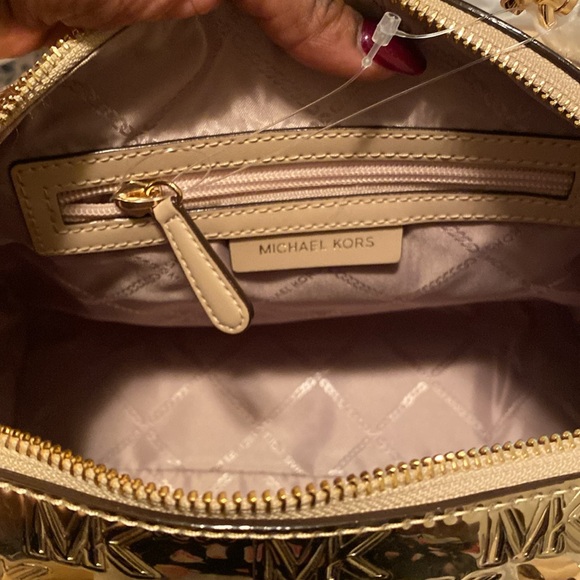 NWT Michael Kord Metallic Satchel
Gold
Never Used - Picture 8 of 9
